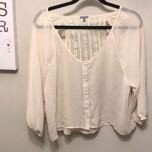 Sheer cream colored top